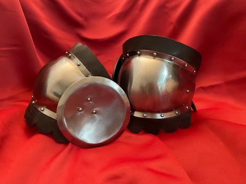 Spring Steel Knees with Rondel Wing and Festoons